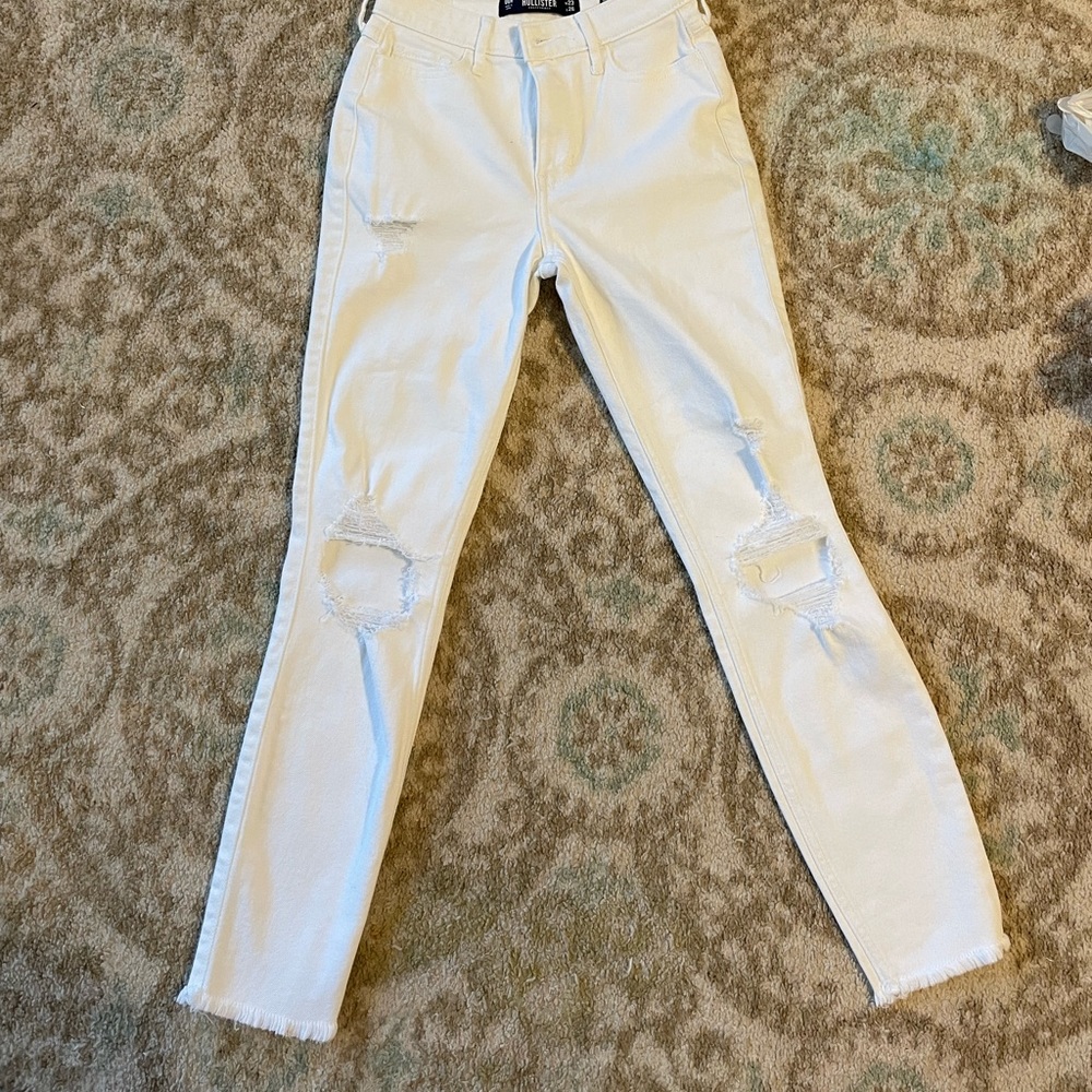 Hollister ripped skinny jeans.